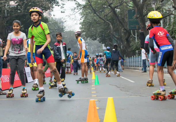 Girls and boys playing Skating
