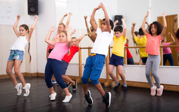 Girls and boys doing Zumba Aerobics